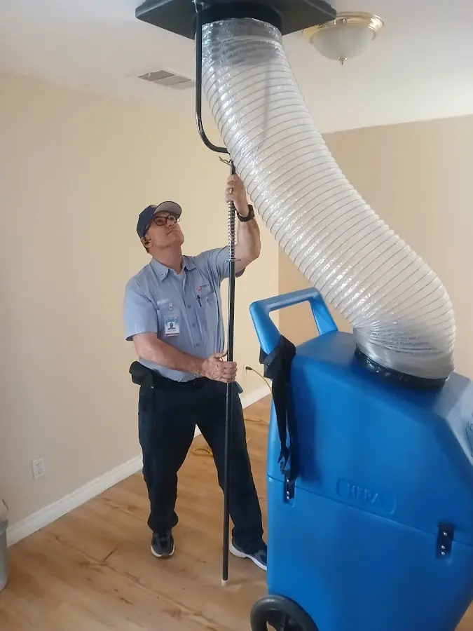 Mini Split Installation technician using HEPA equipment in Tulare